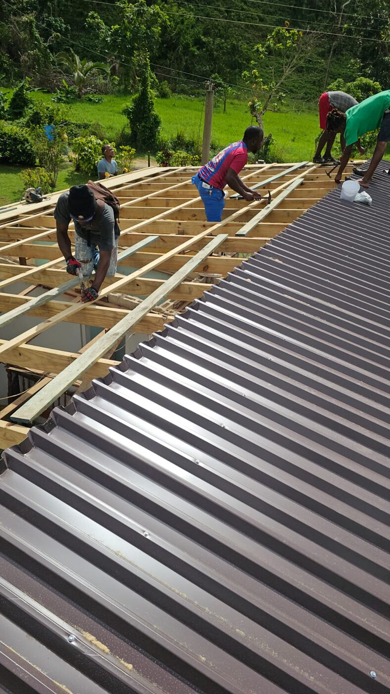 The Kameika & Shawn crew installing a roof